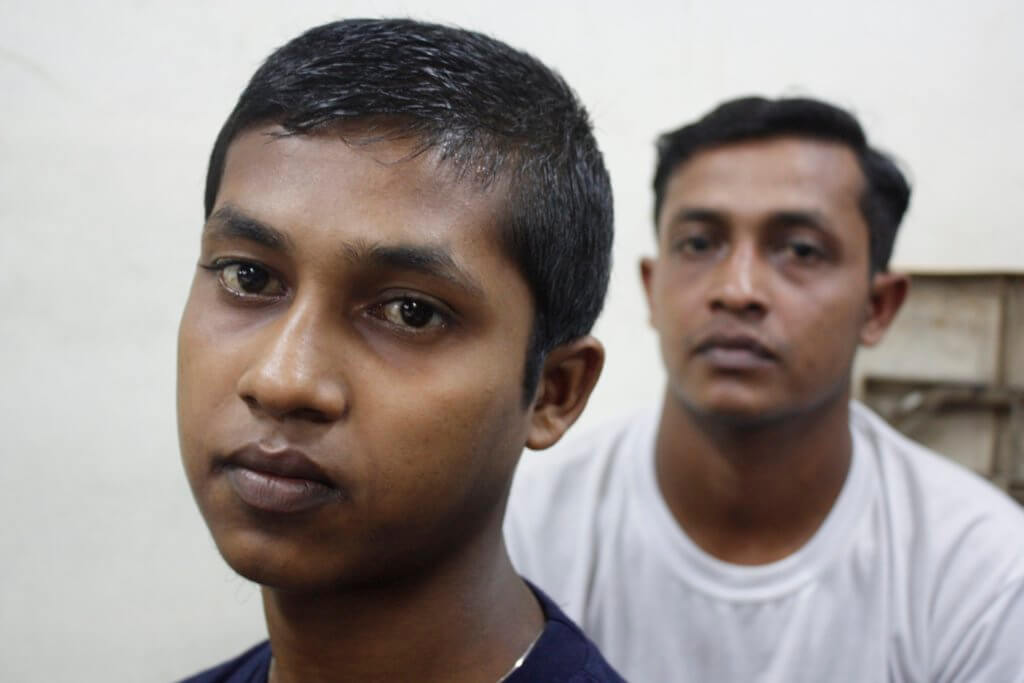Foyas, 20, and Ula Mya, 43, fled internment camps in Myanmar in 2013, boarding a ship they believed would take them to Malaysia. Thai authorities raided their group and detained them for nine months before transferring them to human traffickers. Traffickers, in turn, enslaved and tortured them for approximately three weeks in a remote camp in Thailand, demanding 6,800 Ringgit (US$2,000) for their release. ©Fortify Rights, Pahang State, Malaysia, August 13, 2014
