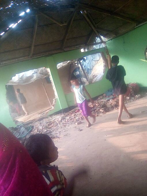 Refugee children walking through the Rohingya Christian church after it was destroyed. ©Private, 2020.